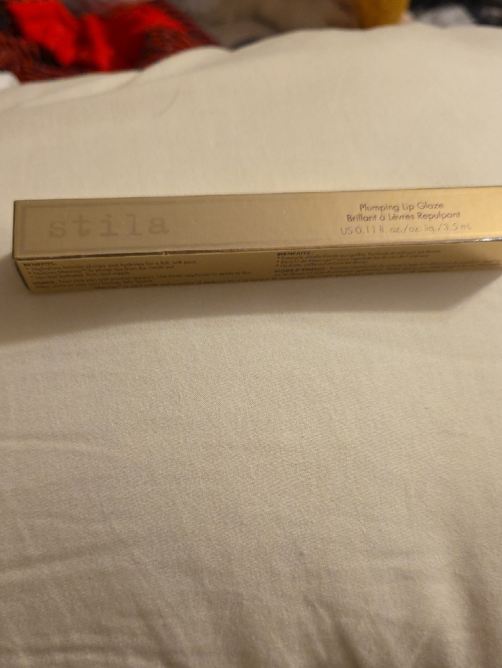 Stila Plumping Lip Glaze in Gold Packaging